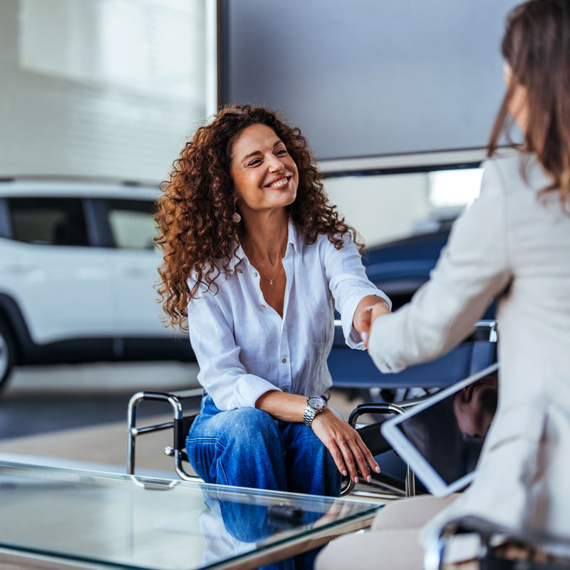 Image - Woman buying a new car.