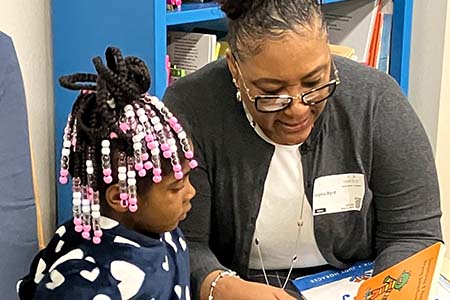 Image - Branch employee reading to a child.